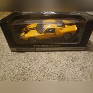 NIB Yellow Ford GT 1:18 Scale Die-Cast Model Car